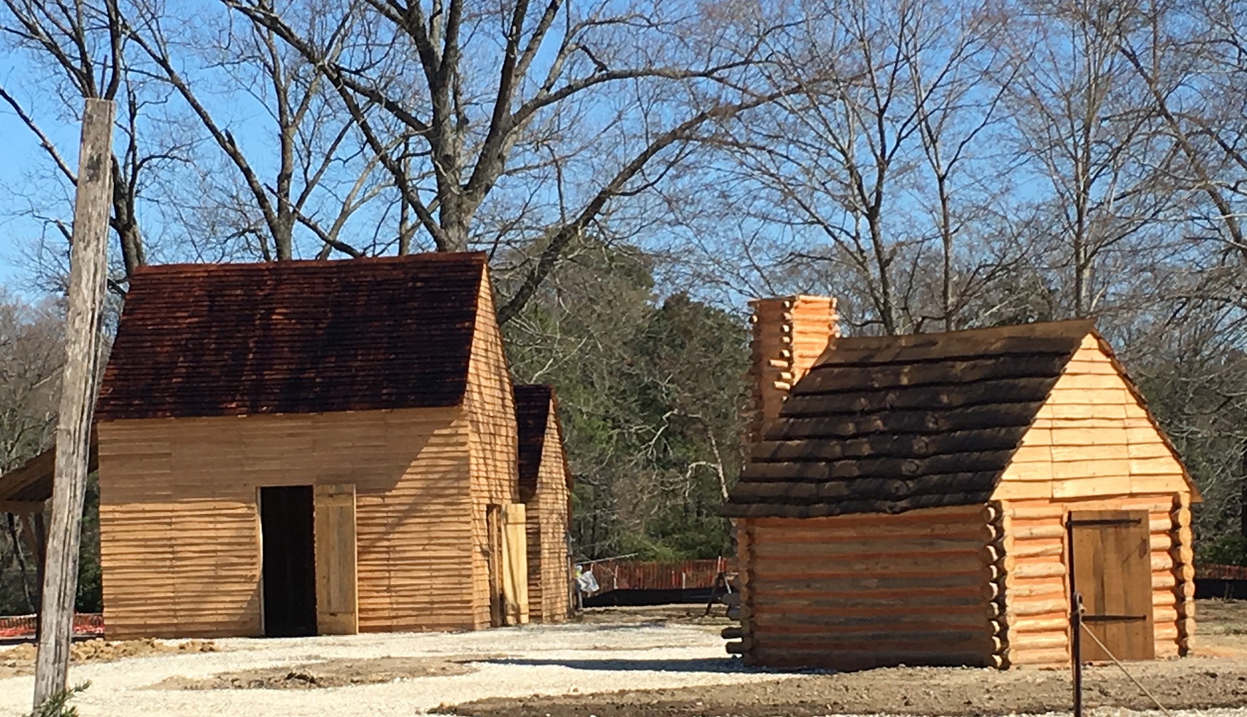 At the American Revolution Museum at Yorktown, the re-created Revolution-era farm features a tobacco barn and quarters for enslaved people.