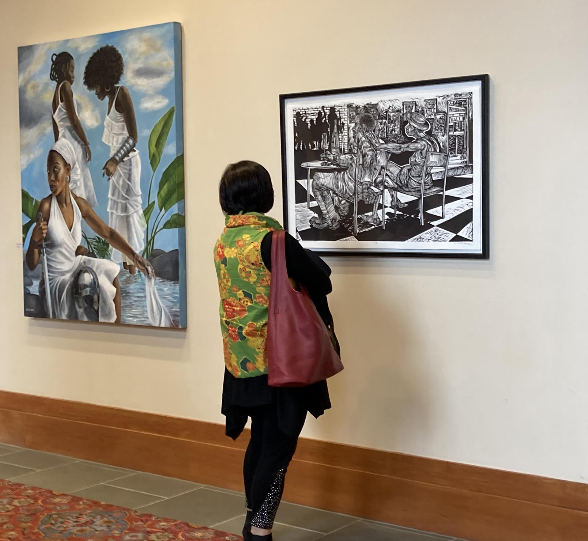 A women looking at artwork