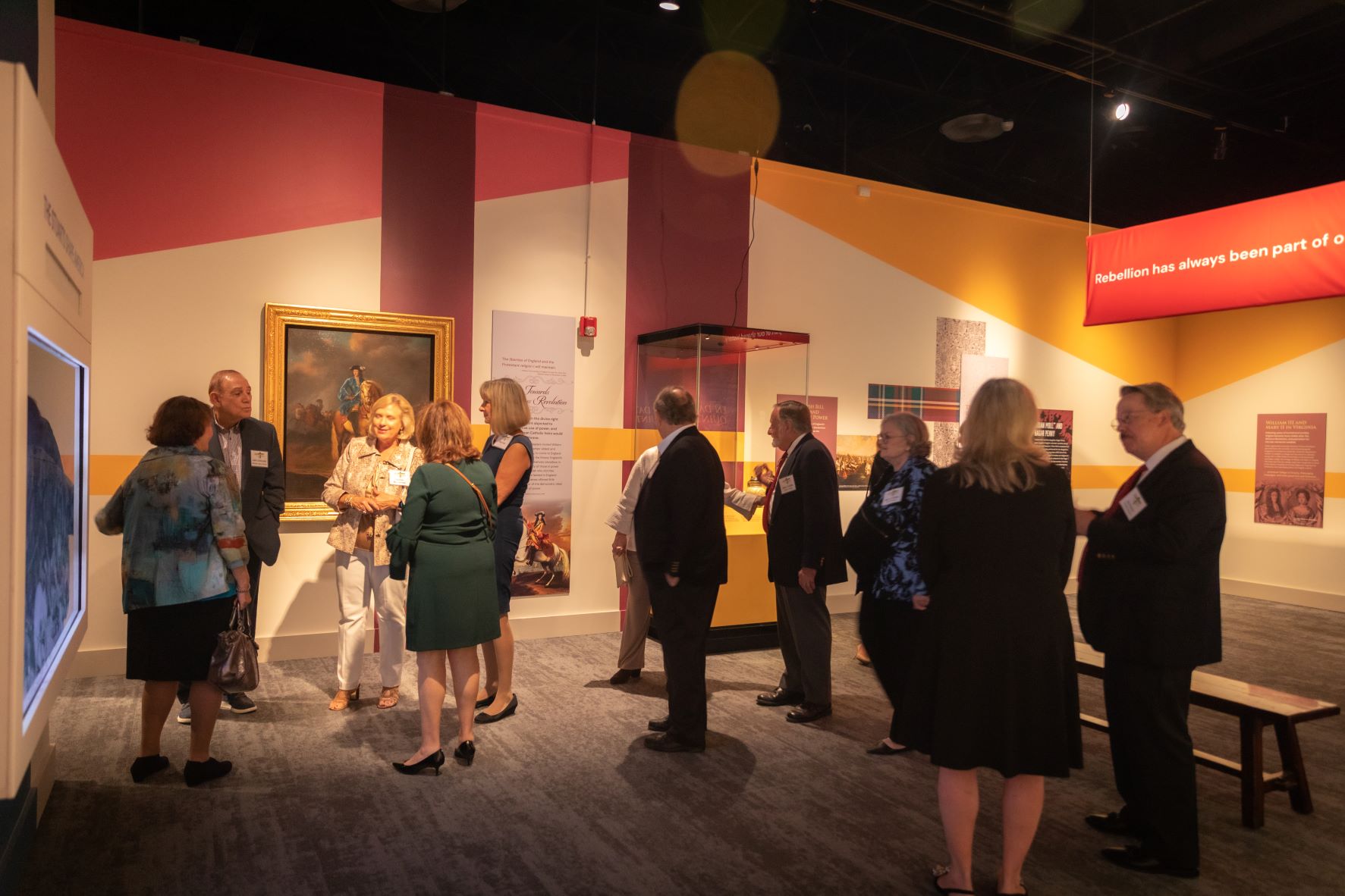 Guests viewing a museum exhibit