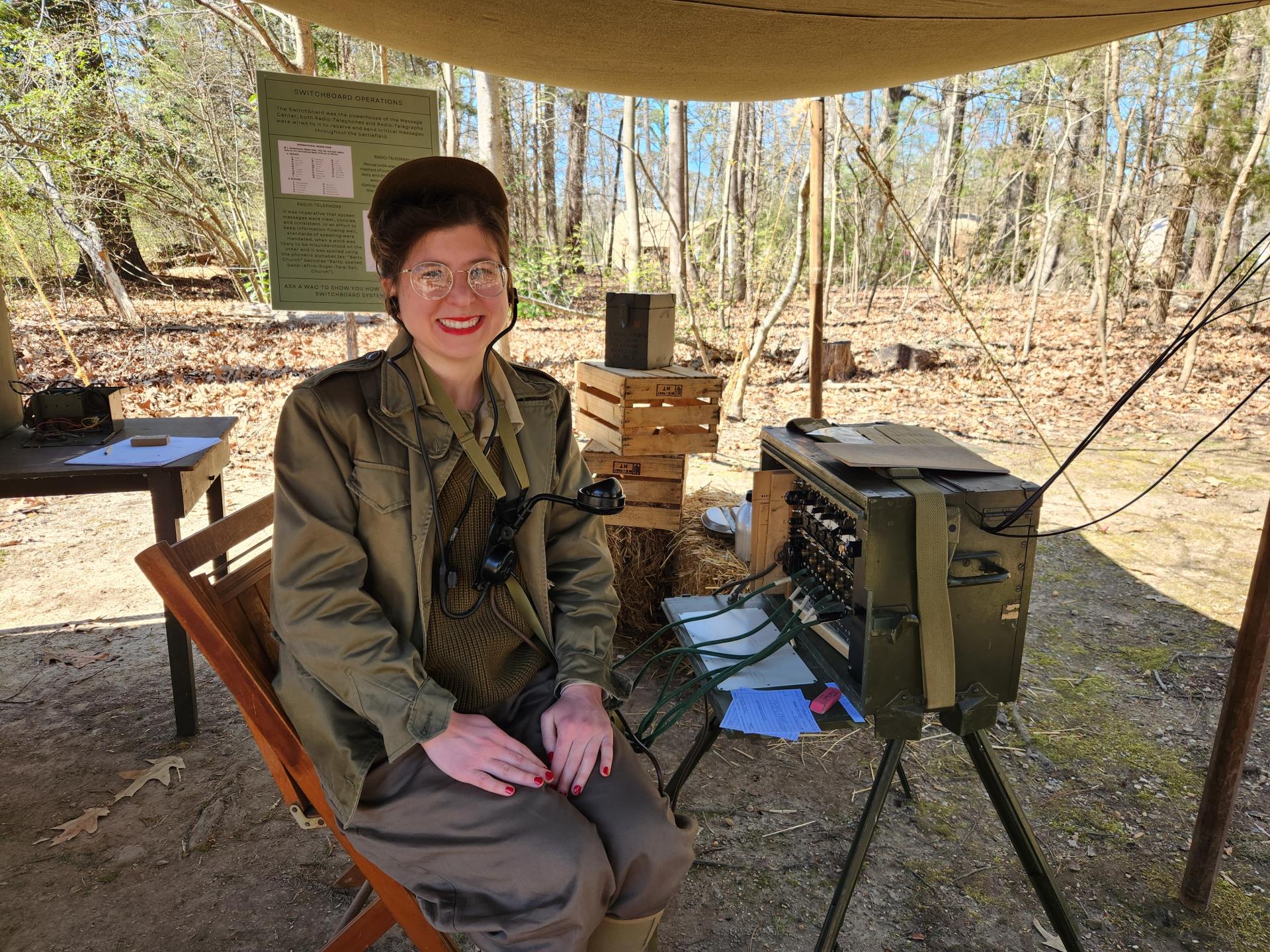 A member of the Hampton Roads Wartime Women Unit works a WWII field switchboard. Jamestown-Yorktown Foundation photo.