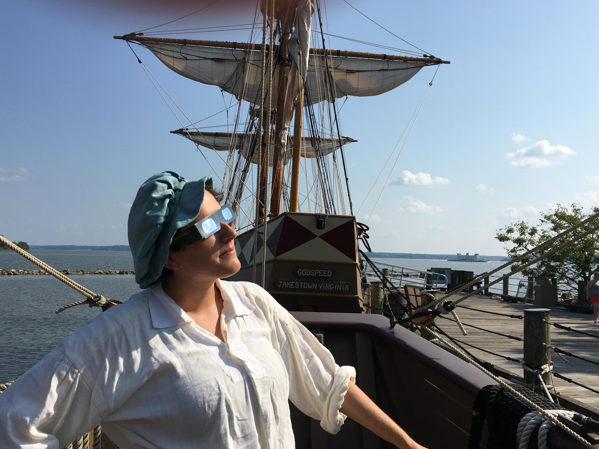 A Jamestown Settlement ships interpreter wearing eclipse-viewing glasses