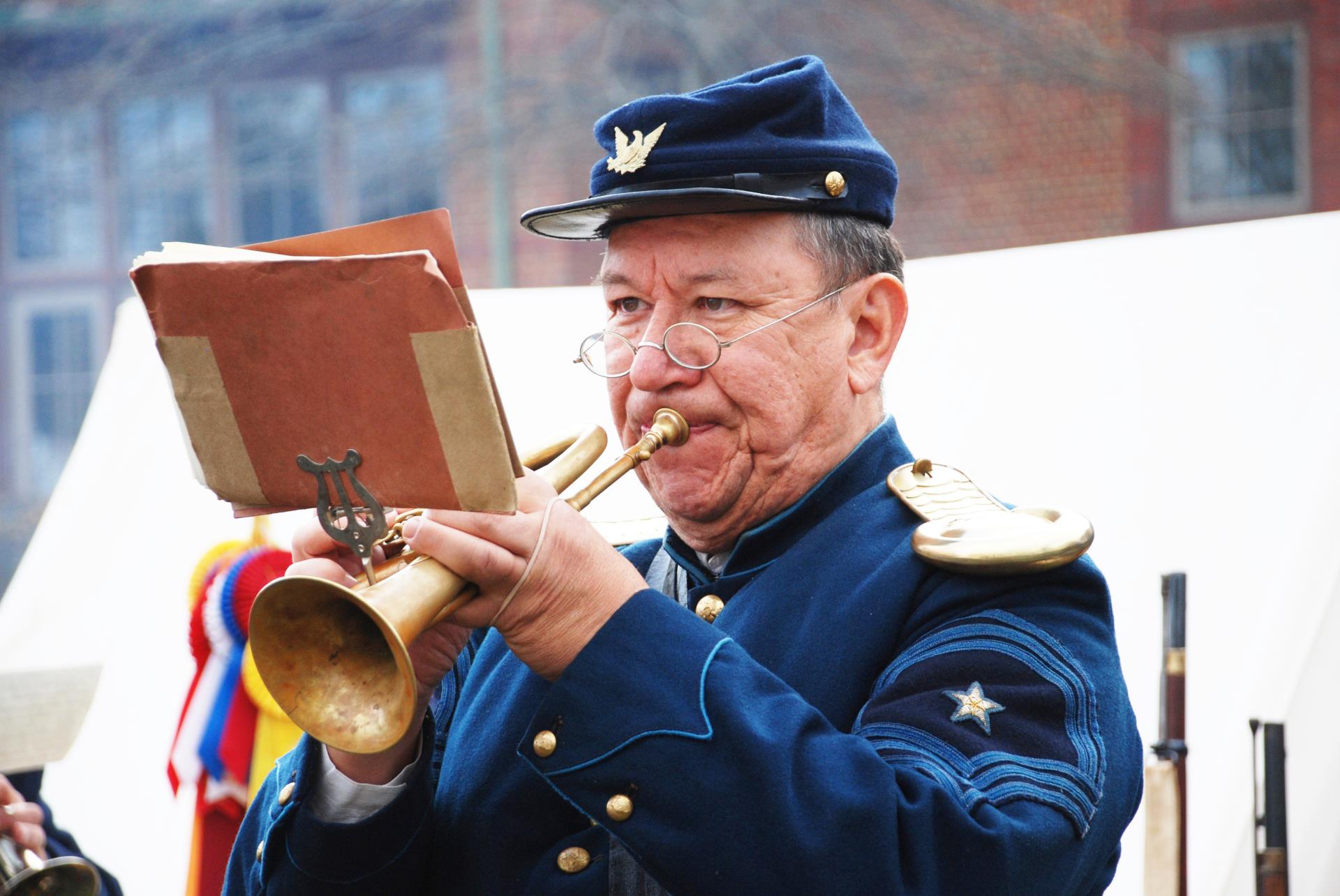 Jari Villanueva plays the bugle