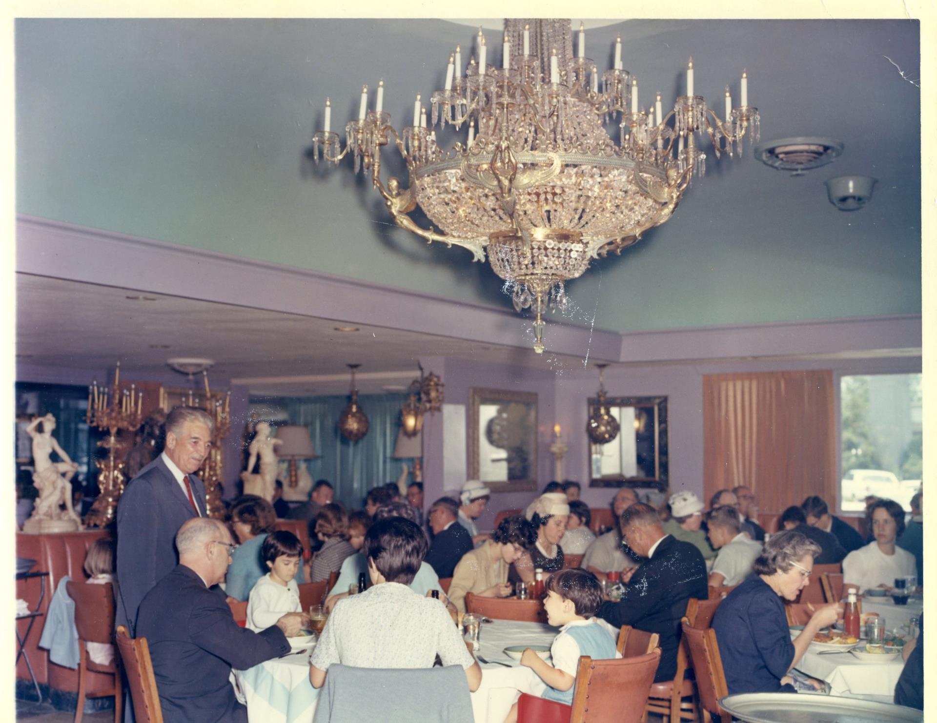 Diners enjoying their meals at Nick's Seafood Pavilion restaurant