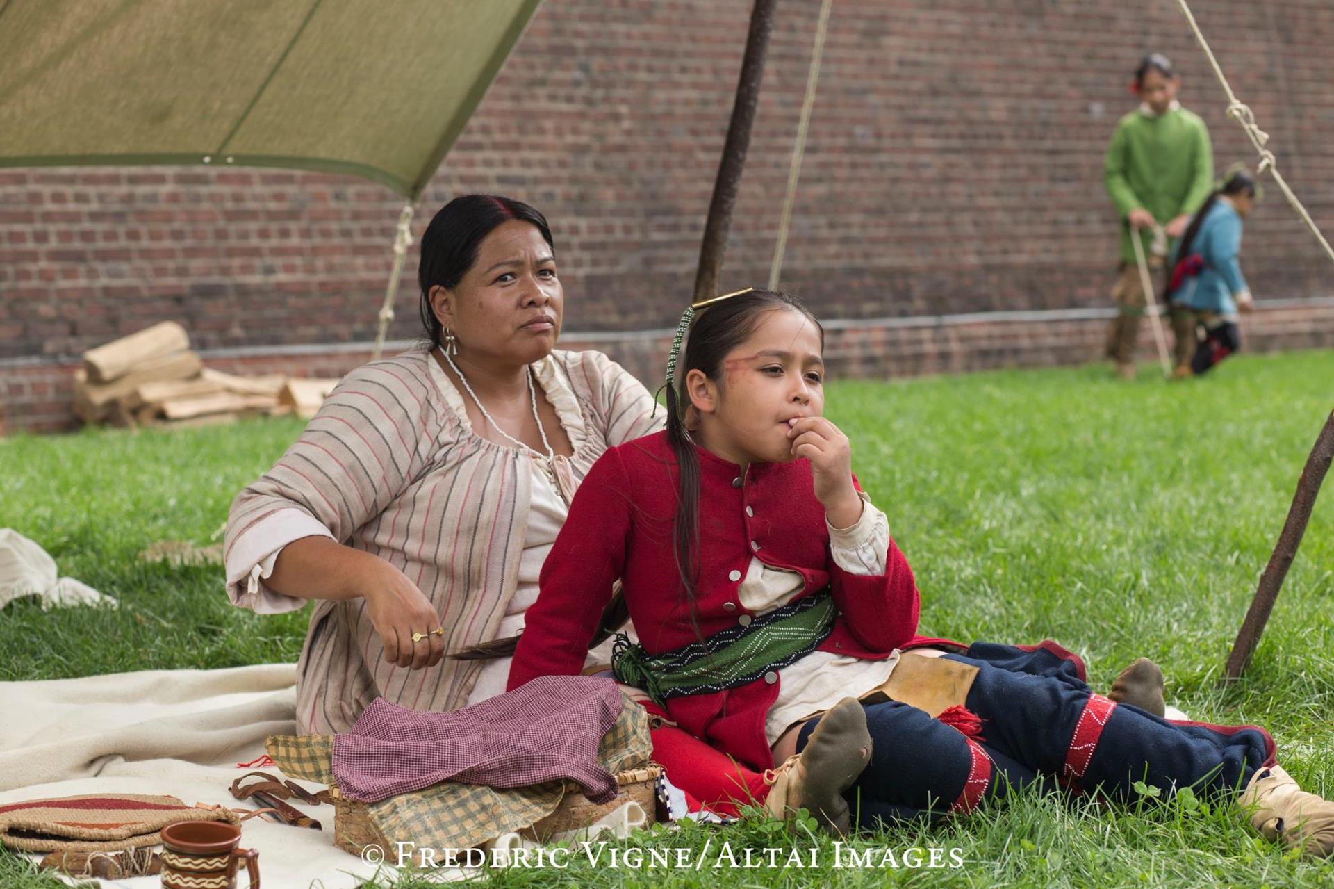 Cultural interpreters in Indigenous costume