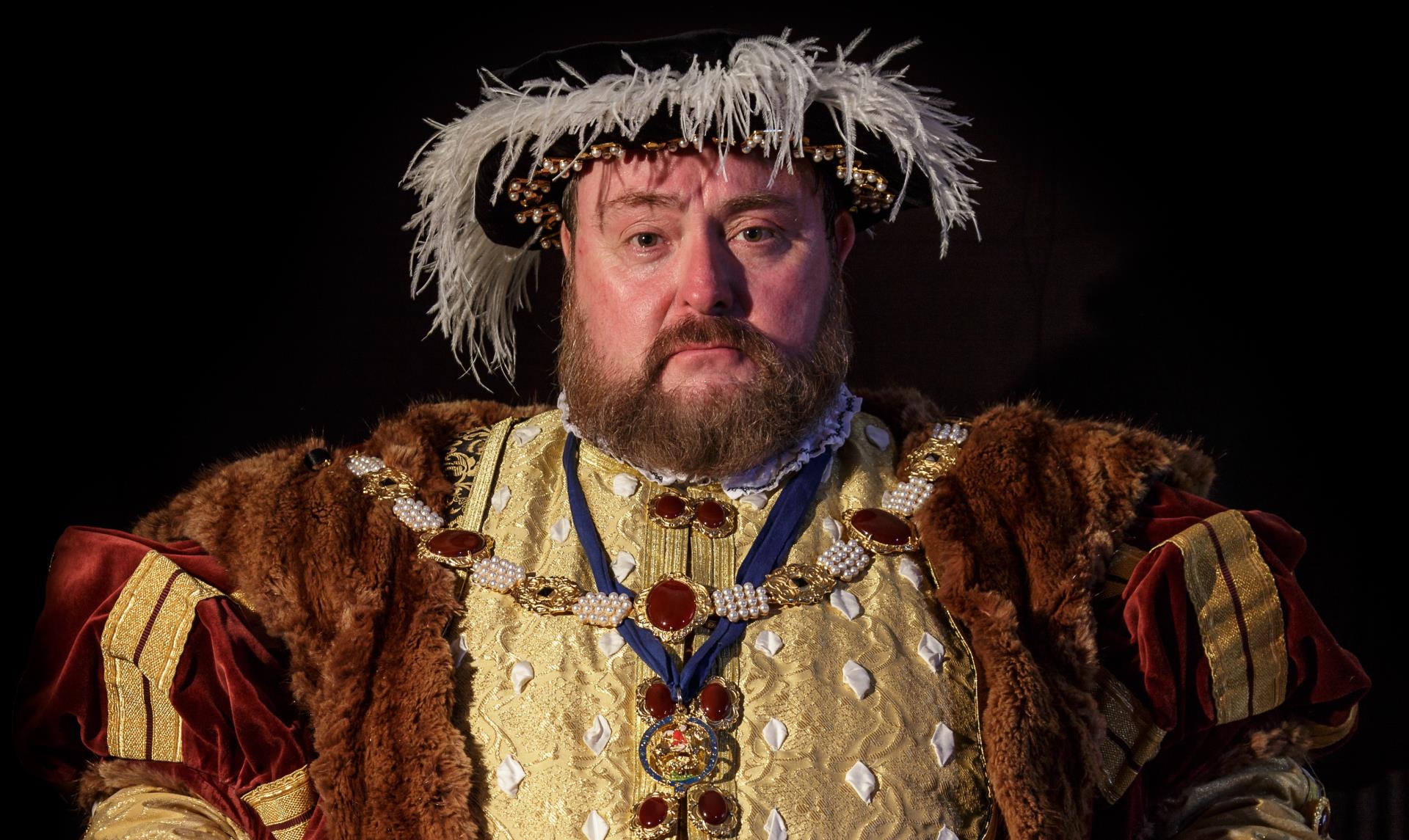 A photo of a costumed interpreter as King Henry VIII